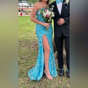 Elegant Blue Strapless Gown with Floral Embellishments